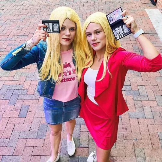 Dynamic and iconic girls rocking Dumb and Dumber Halloween costumes during the halloween bar crawl in Baltimore.
