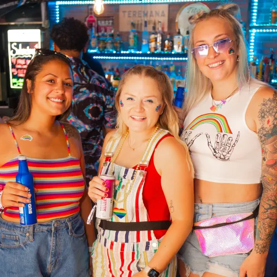 Squad goals! This group's rainbow vibes are lighting up the Bar Crawl scene.