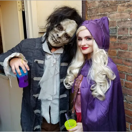 A dynamic duo showcasing their hocus pocus costumes featuring Sarah Sanderson and Billy Butcherson during the halloween bar crawl
