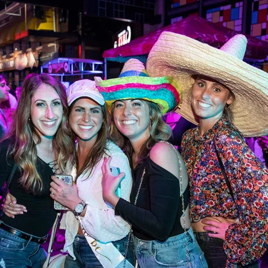 4 girls in sombreros at the margarita bar crawl 