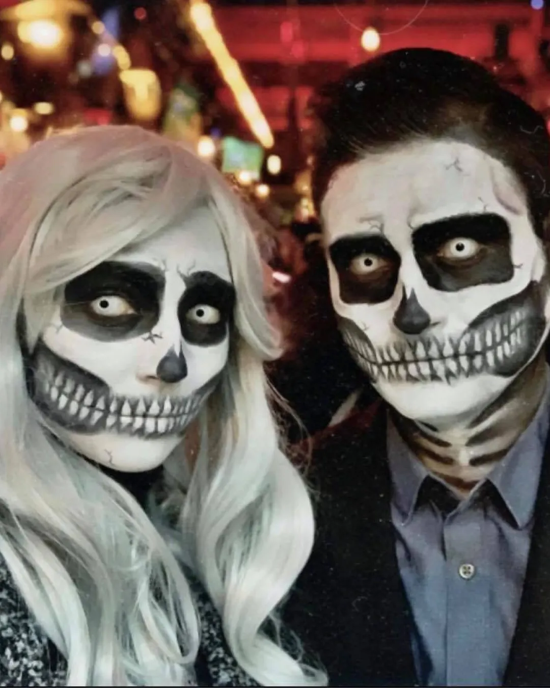 In a sea of costumes, this creative couple show off their halloween themed makeup and costume choices, which proves to be both enchanting and entertaining during the bar crawl