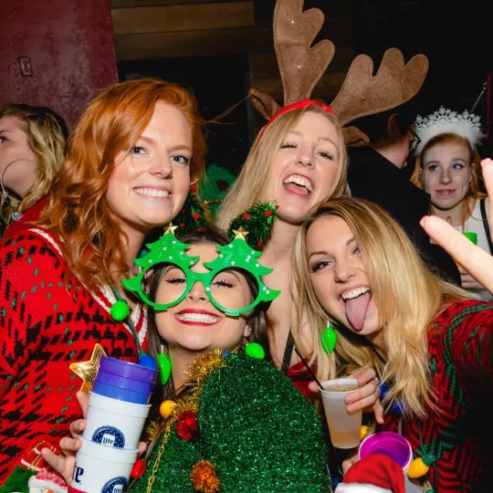 Who needs a silent night when there's an ugly sweater bar crawl happening