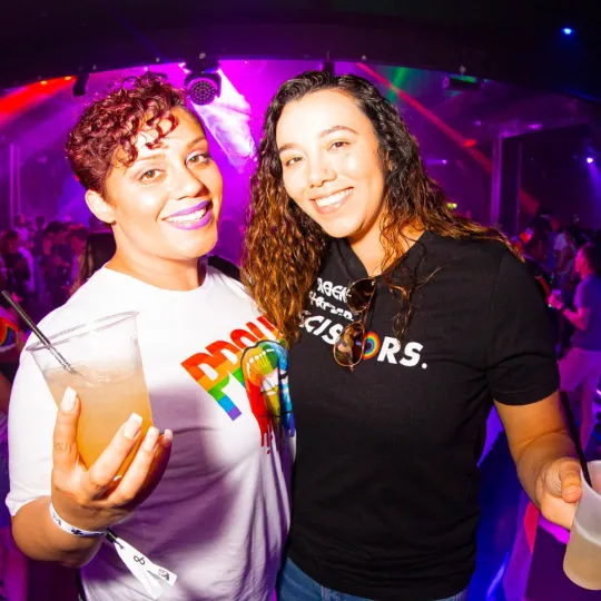 Pride Bar Crawl's most colorful entourage, turning every moment into a photo opp.