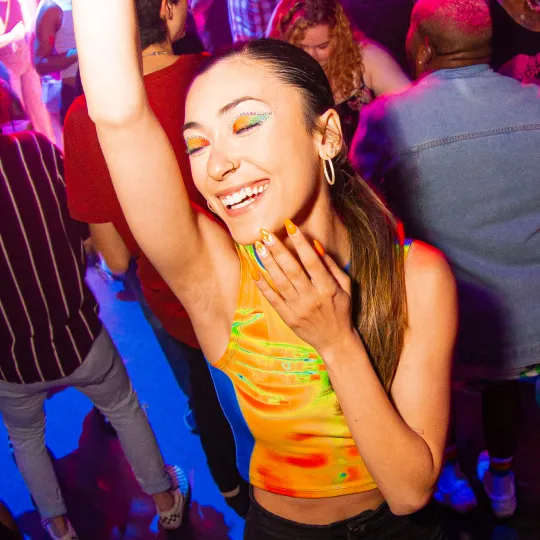 Bar Crawl vibes peak when this colorful girl hits the dance floor